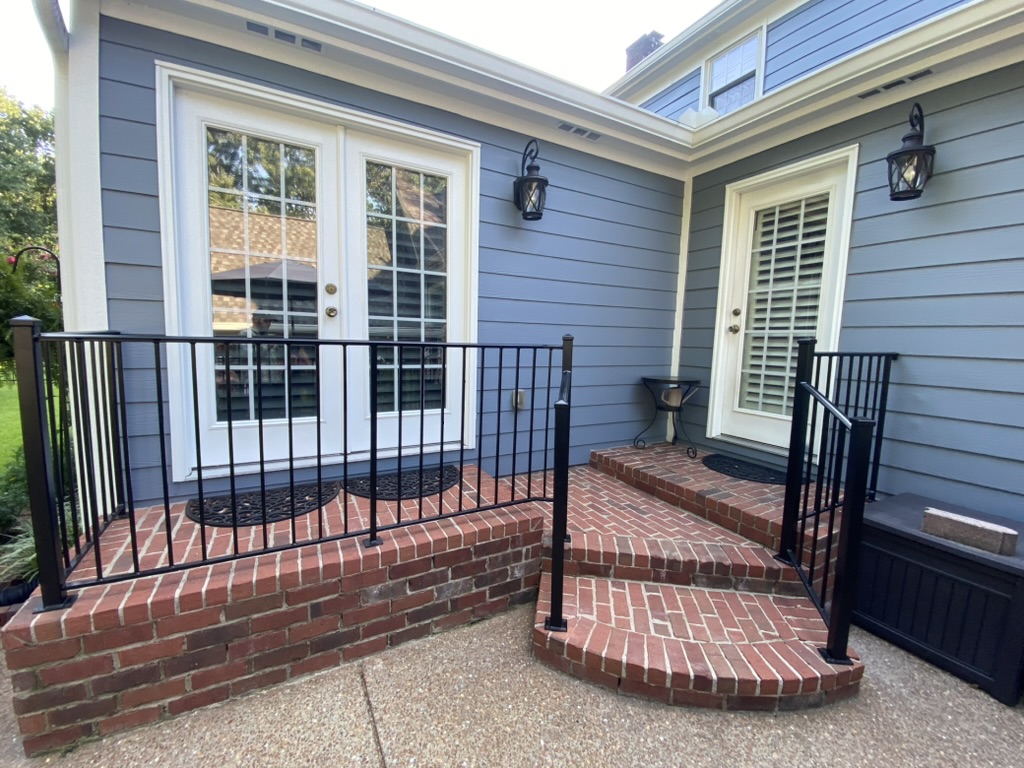 metal fence in nashville surrounding back walkway