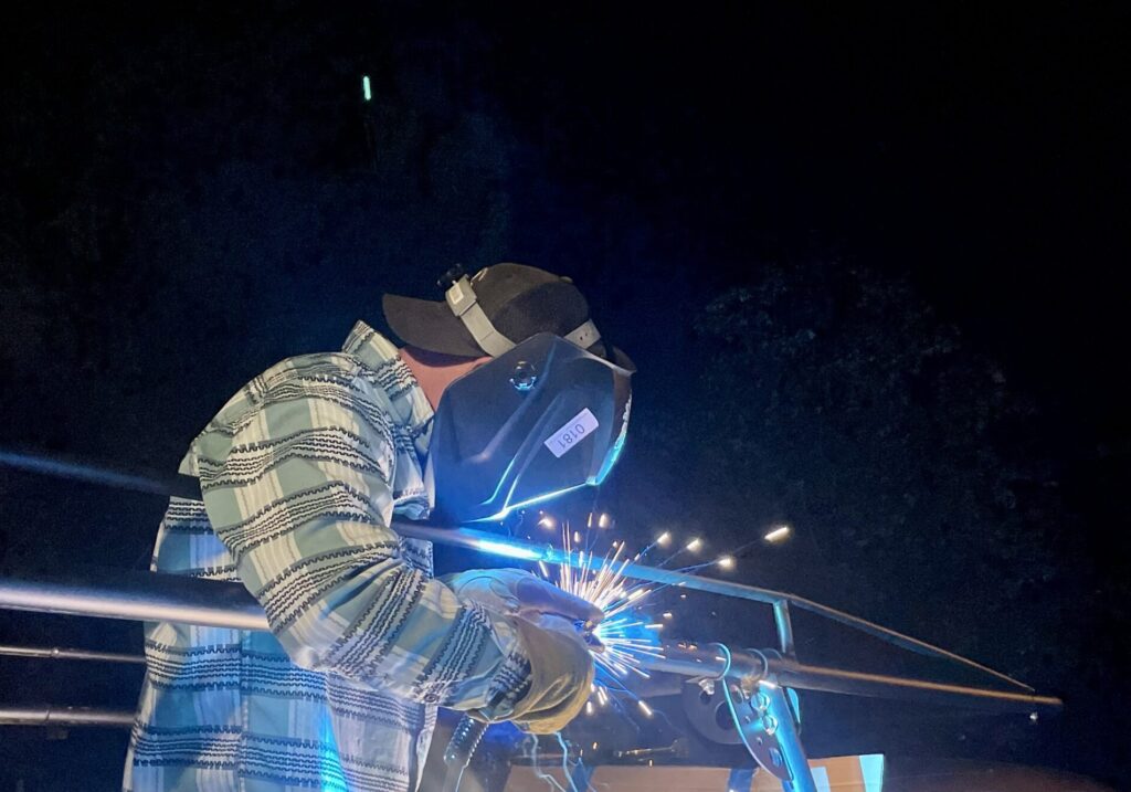 welder working on custom metal fabrication in nashville